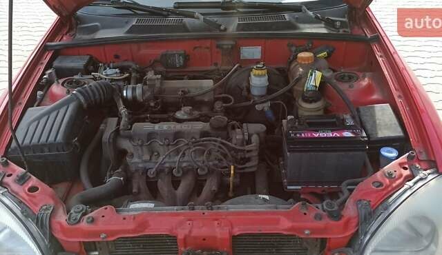 Красный Дэу Ланос, объемом двигателя 1.5 л и пробегом 437 тыс. км за 2150 $, фото 12 на Automoto.ua