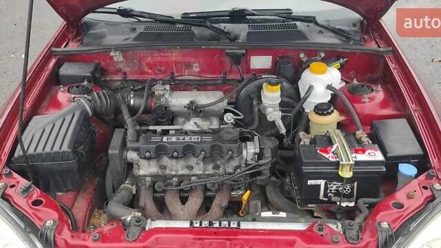 Красный Дэу Ланос, объемом двигателя 1.5 л и пробегом 270 тыс. км за 2200 $, фото 7 на Automoto.ua