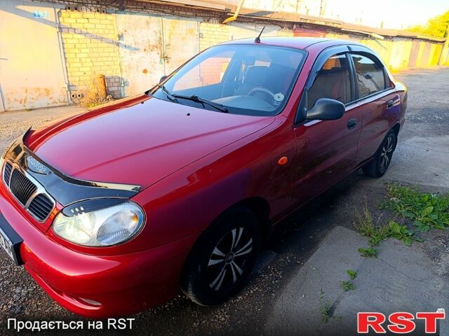 Красный Дэу Ланос, объемом двигателя 1.4 л и пробегом 130 тыс. км за 3300 $, фото 2 на Automoto.ua
