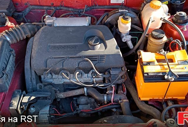 Красный Дэу Ланос, объемом двигателя 1.4 л и пробегом 161 тыс. км за 3000 $, фото 5 на Automoto.ua