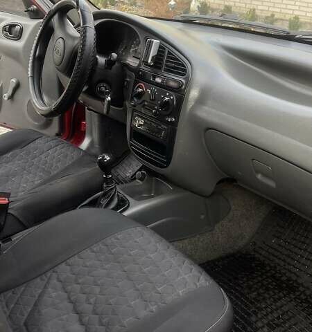 Красный Дэу Ланос, объемом двигателя 1.5 л и пробегом 160 тыс. км за 2100 $, фото 9 на Automoto.ua