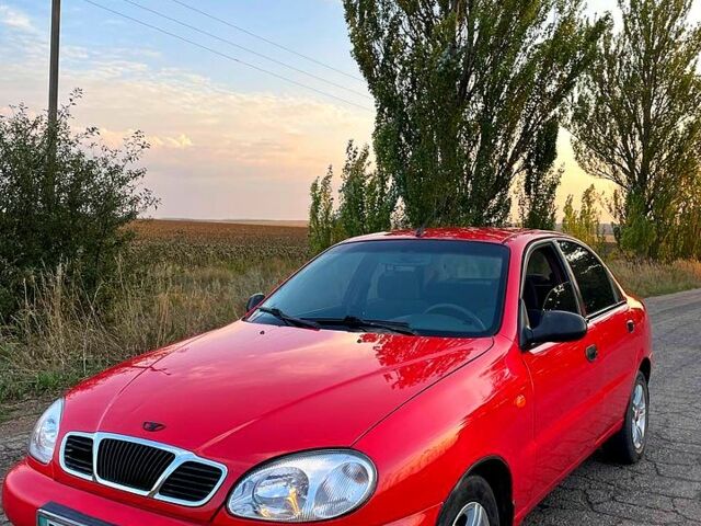 Красный Дэу Ланос, объемом двигателя 1.4 л и пробегом 95 тыс. км за 1999 $, фото 7 на Automoto.ua