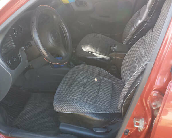 Красный Дэу Ланос, объемом двигателя 1.39 л и пробегом 60 тыс. км за 2700 $, фото 12 на Automoto.ua