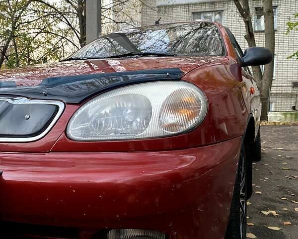 Красный Дэу Ланос, объемом двигателя 1.5 л и пробегом 182 тыс. км за 3000 $, фото 10 на Automoto.ua