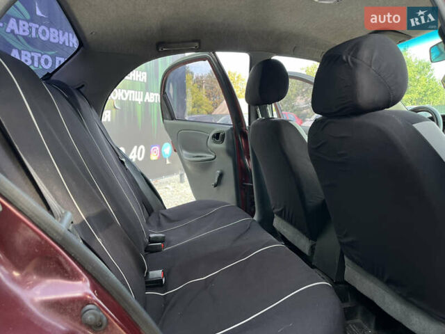 Красный Дэу Ланос, объемом двигателя 1.5 л и пробегом 263 тыс. км за 2600 $, фото 16 на Automoto.ua