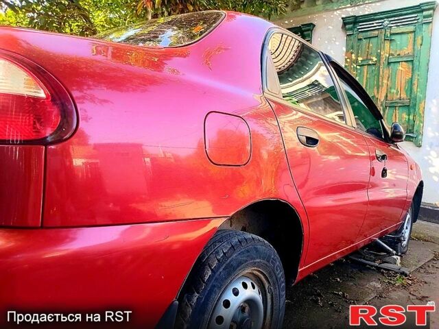 Червоний Деу Ланос, об'ємом двигуна 1.5 л та пробігом 112 тис. км за 1900 $, фото 7 на Automoto.ua