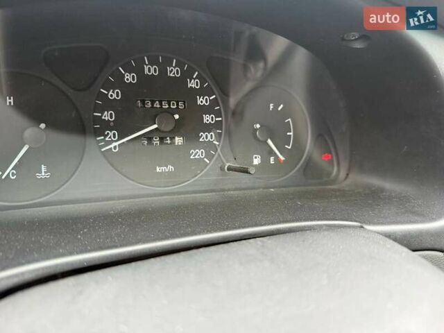 Красный Дэу Ланос, объемом двигателя 1.5 л и пробегом 135 тыс. км за 2450 $, фото 2 на Automoto.ua