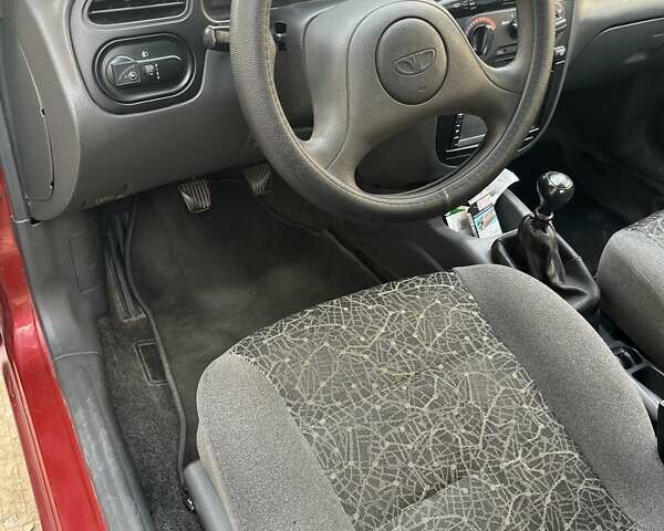 Красный Дэу Ланос, объемом двигателя 1.5 л и пробегом 211 тыс. км за 2900 $, фото 8 на Automoto.ua