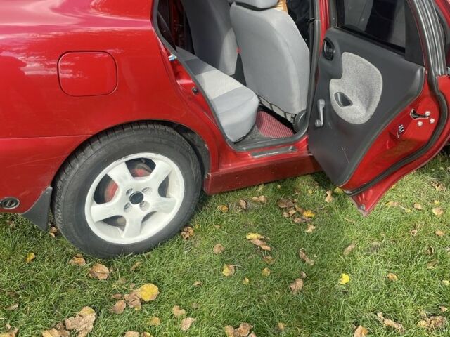 Червоний Деу Ланос, об'ємом двигуна 1.5 л та пробігом 170 тис. км за 2600 $, фото 2 на Automoto.ua