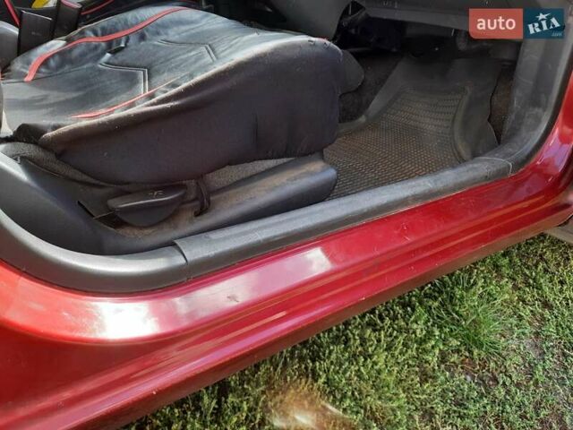 Деу Ланос 2008 у Києві на Automoto.ua Червоний Деу Ланос, об'ємом двигуна 1.5 л та пробігом 180 тис. км за 1400 $, фото 8 на Automoto.ua