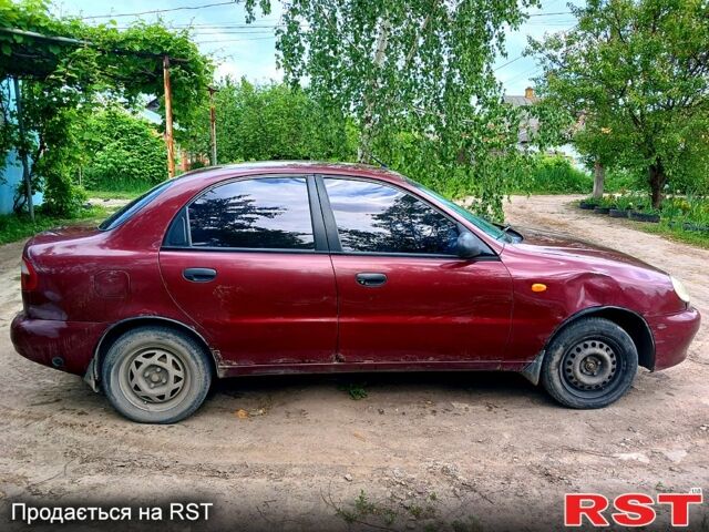 Красный Дэу Ланос, объемом двигателя 1.5 л и пробегом 261 тыс. км за 1400 $, фото 2 на Automoto.ua