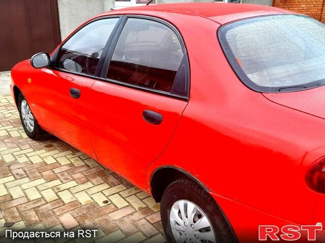 Красный Дэу Ланос, объемом двигателя 1.5 л и пробегом 181 тыс. км за 1999 $, фото 5 на Automoto.ua