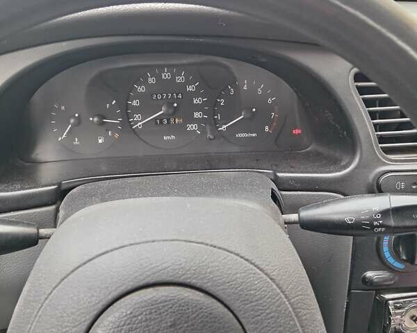 Красный Дэу Ланос, объемом двигателя 1.5 л и пробегом 207 тыс. км за 2300 $, фото 1 на Automoto.ua