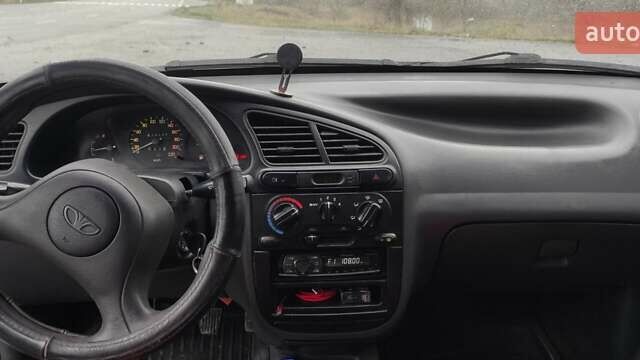Красный Дэу Ланос, объемом двигателя 1.5 л и пробегом 270 тыс. км за 2200 $, фото 6 на Automoto.ua