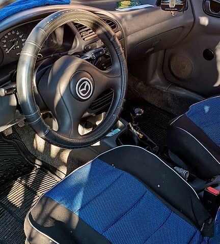 Красный Дэу Ланос, объемом двигателя 1.4 л и пробегом 161 тыс. км за 3000 $, фото 9 на Automoto.ua