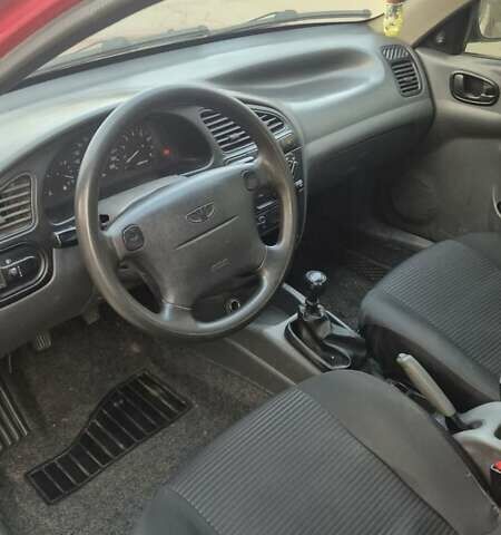 Красный Дэу Ланос, объемом двигателя 1.6 л и пробегом 89 тыс. км за 1950 $, фото 5 на Automoto.ua