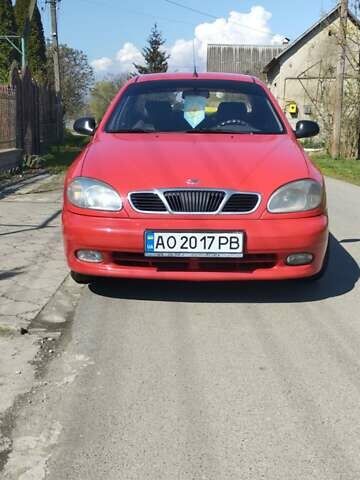 Красный Дэу Ланос, объемом двигателя 1.5 л и пробегом 302 тыс. км за 1800 $, фото 1 на Automoto.ua