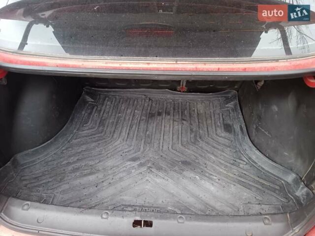 Красный Дэу Ланос, объемом двигателя 1.5 л и пробегом 210 тыс. км за 1800 $, фото 7 на Automoto.ua