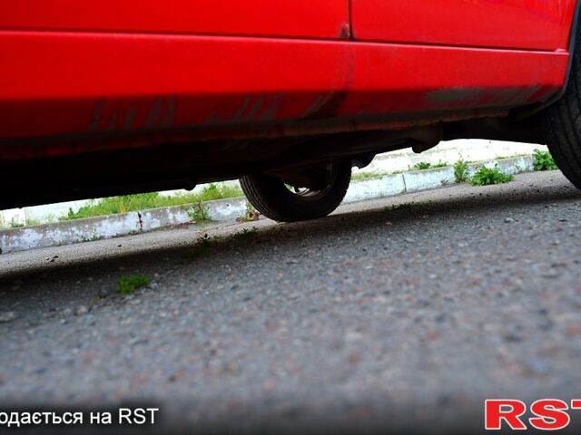 Красный Дэу Ланос, объемом двигателя 1.5 л и пробегом 228 тыс. км за 2500 $, фото 4 на Automoto.ua