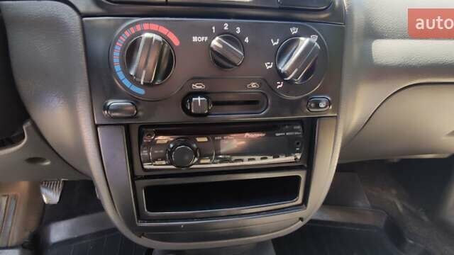 Красный Дэу Ланос, объемом двигателя 1.5 л и пробегом 288 тыс. км за 1890 $, фото 19 на Automoto.ua