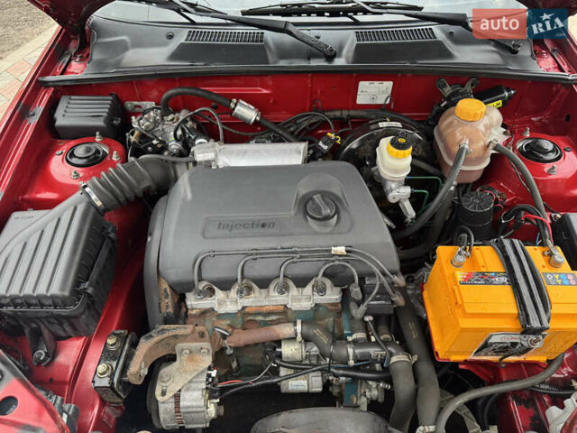 Красный Дэу Ланос, объемом двигателя 1.4 л и пробегом 44 тыс. км за 3700 $, фото 8 на Automoto.ua