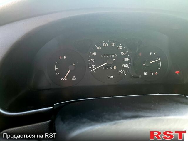 Красный Дэу Ланос, объемом двигателя 1.4 л и пробегом 150 тыс. км за 2700 $, фото 6 на Automoto.ua