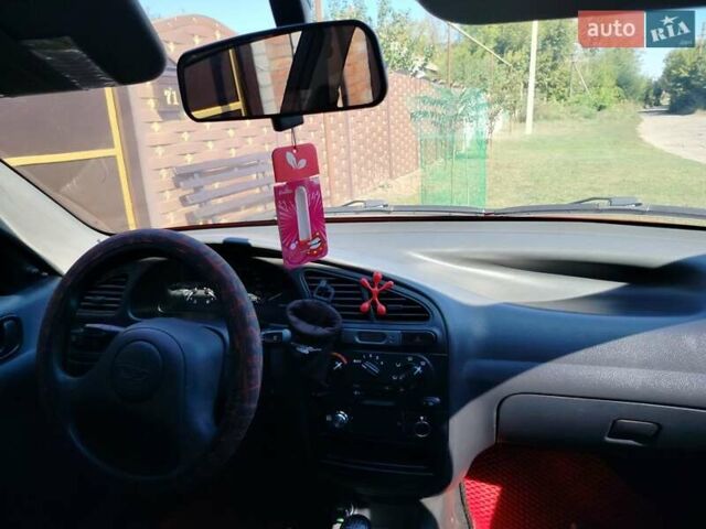 Деу Ланос 2008 у Богодухове на Automoto.ua Червоний Деу Ланос, об'ємом двигуна 1.5 л та пробігом 153 тис. км за 2600 $, фото 15 на Automoto.ua