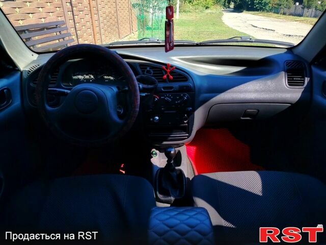 Червоний Деу Ланос, об'ємом двигуна 1.5 л та пробігом 151 тис. км за 2800 $, фото 5 на Automoto.ua