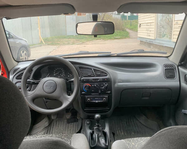 Красный Дэу Ланос, объемом двигателя 1.4 л и пробегом 73 тыс. км за 1750 $, фото 14 на Automoto.ua