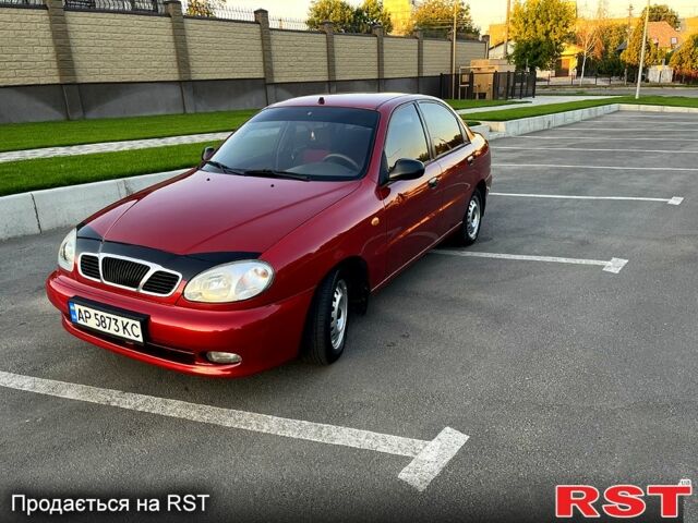 Красный Дэу Ланос, объемом двигателя 1.4 л и пробегом 150 тыс. км за 2700 $, фото 3 на Automoto.ua