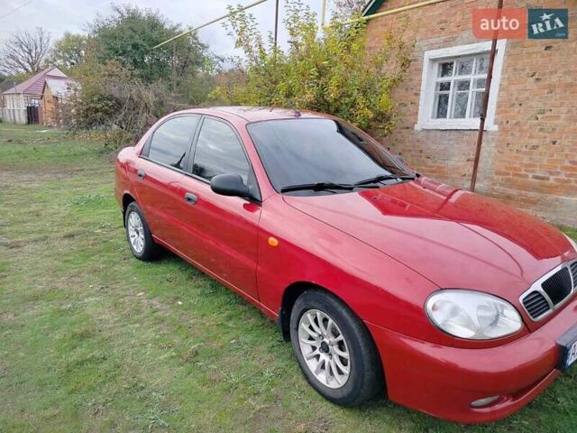 Деу Ланос 2008 у Богодухове на Automoto.ua Червоний Деу Ланос, об'ємом двигуна 1.5 л та пробігом 153 тис. км за 2600 $, фото 8 на Automoto.ua
