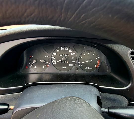Красный Дэу Ланос, объемом двигателя 1.5 л и пробегом 385 тыс. км за 2350 $, фото 8 на Automoto.ua