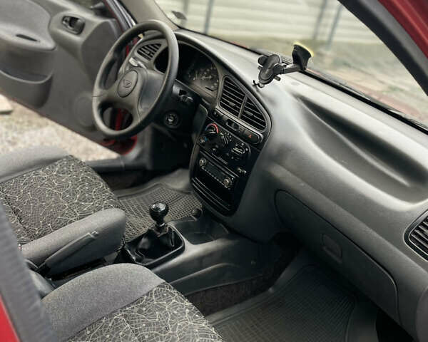 Красный Дэу Ланос, объемом двигателя 1.5 л и пробегом 285 тыс. км за 2600 $, фото 14 на Automoto.ua