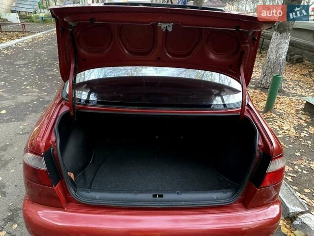 Красный Дэу Ланос, объемом двигателя 1.5 л и пробегом 182 тыс. км за 3000 $, фото 3 на Automoto.ua