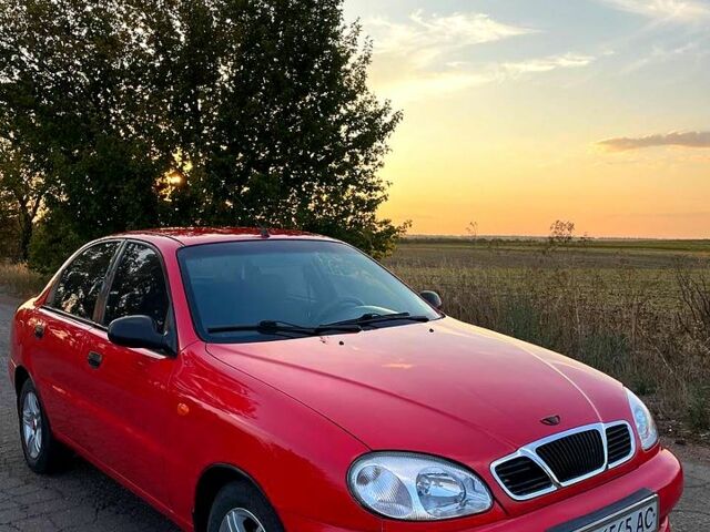 Красный Дэу Ланос, объемом двигателя 1.4 л и пробегом 95 тыс. км за 1999 $, фото 6 на Automoto.ua