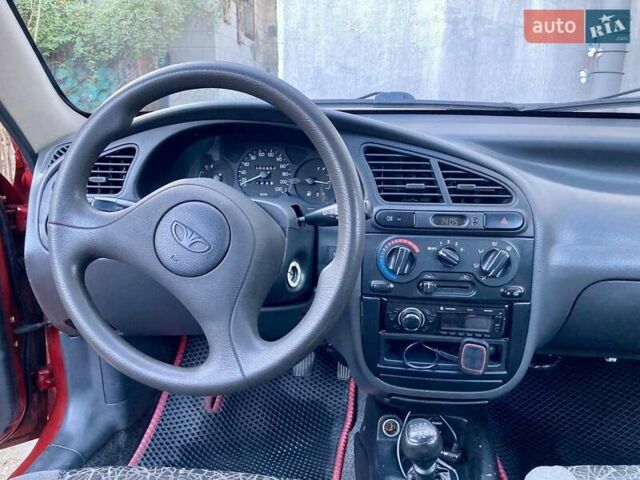 Красный Дэу Ланос, объемом двигателя 1.4 л и пробегом 103 тыс. км за 2700 $, фото 4 на Automoto.ua