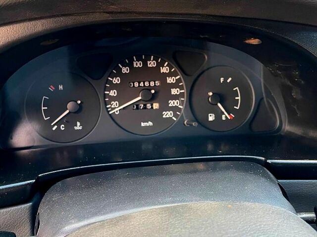 Красный Дэу Ланос, объемом двигателя 1.4 л и пробегом 95 тыс. км за 1999 $, фото 2 на Automoto.ua