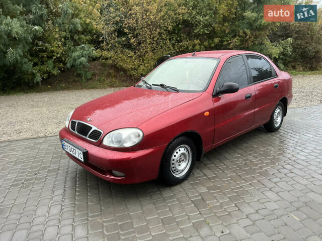 Красный Дэу Ланос, объемом двигателя 1.5 л и пробегом 200 тыс. км за 2400 $, фото 10 на Automoto.ua