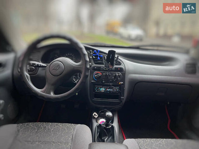 Красный Дэу Ланос, объемом двигателя 1.4 л и пробегом 201 тыс. км за 3200 $, фото 4 на Automoto.ua