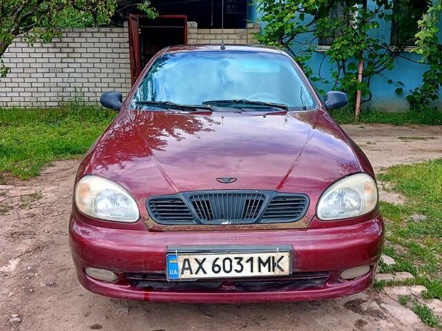 Красный Дэу Ланос, объемом двигателя 1.5 л и пробегом 261 тыс. км за 1400 $, фото 1 на Automoto.ua