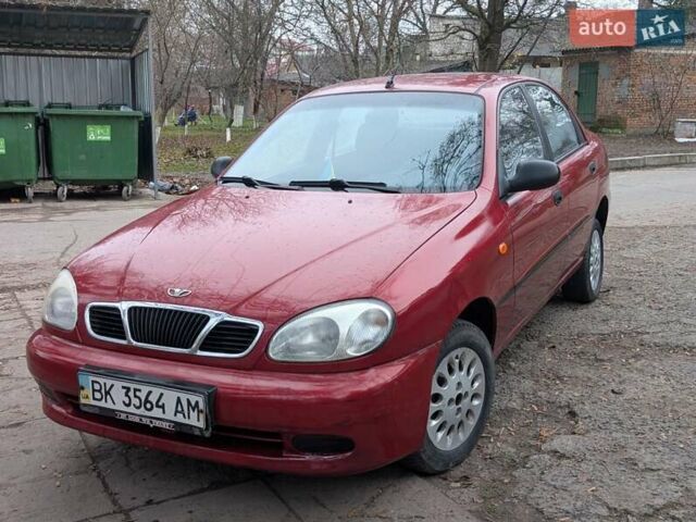 Красный Дэу Ланос, объемом двигателя 1.4 л и пробегом 156 тыс. км за 1950 $, фото 1 на Automoto.ua