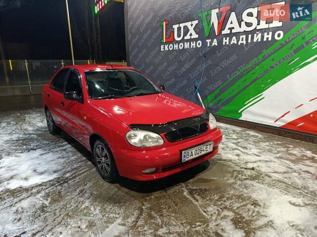 Красный Дэу Ланос, объемом двигателя 1.5 л и пробегом 257 тыс. км за 2000 $, фото 1 на Automoto.ua