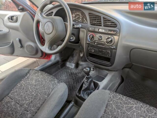 Красный Дэу Ланос, объемом двигателя 1.5 л и пробегом 132 тыс. км за 3000 $, фото 9 на Automoto.ua