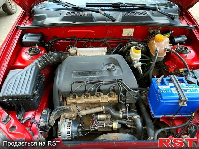 Червоний Деу Ланос, об'ємом двигуна 1.4 л та пробігом 109 тис. км за 2600 $, фото 4 на Automoto.ua