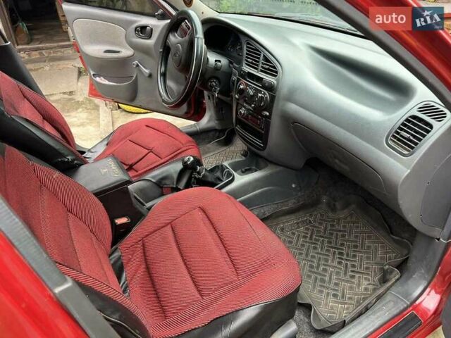 Дэу Ланос 2008 в Чернигове на Automoto.ua Красный Дэу Ланос, объемом двигателя 1.4 л и пробегом 85 тыс. км за 3100 $, фото 4 на Automoto.ua