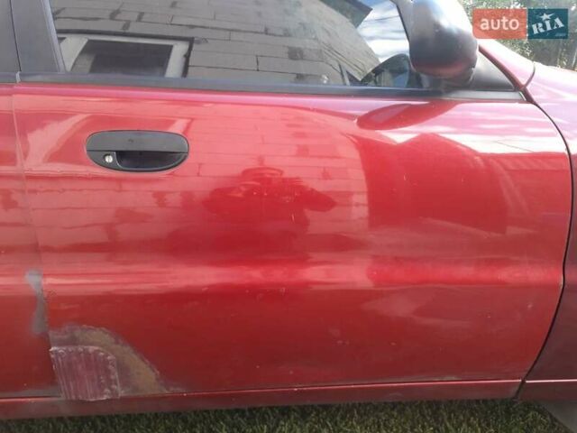 Деу Ланос 2008 у Києві на Automoto.ua Червоний Деу Ланос, об'ємом двигуна 1.5 л та пробігом 180 тис. км за 1400 $, фото 1 на Automoto.ua