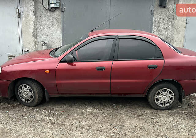 Красный Дэу Ланос, объемом двигателя 1.5 л и пробегом 220 тыс. км за 2200 $, фото 13 на Automoto.ua