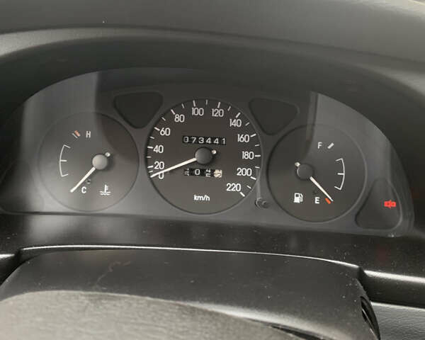 Красный Дэу Ланос, объемом двигателя 1.4 л и пробегом 73 тыс. км за 1750 $, фото 19 на Automoto.ua