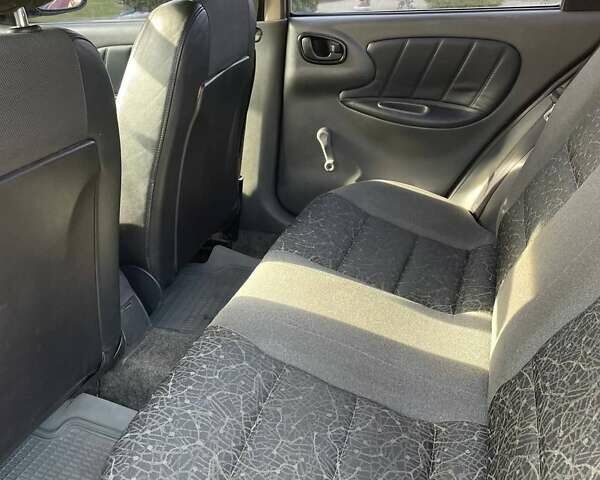Красный Дэу Ланос, объемом двигателя 1.5 л и пробегом 251 тыс. км за 2900 $, фото 4 на Automoto.ua