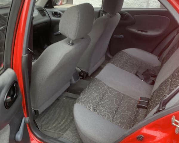 Красный Дэу Ланос, объемом двигателя 1.4 л и пробегом 73 тыс. км за 1750 $, фото 16 на Automoto.ua